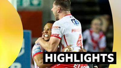 St Helens players jump on each other in celebration