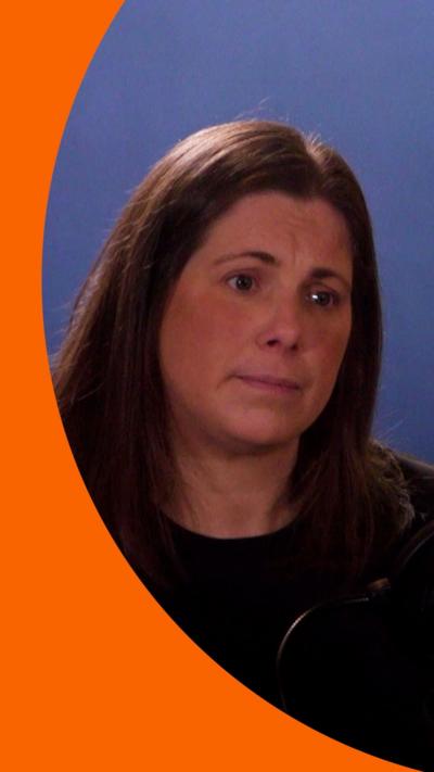 Lindsey Burrow wears a black jumper and looks out of shot.