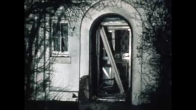 The damaged home of Employment Secretary Robert Carr.