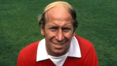 Bobby Charlton, wearing a red jersey