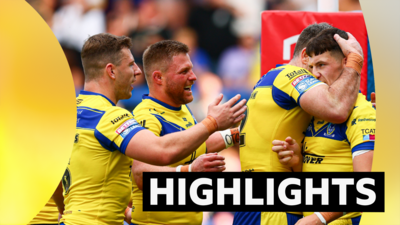 Warrington Wolves' Josh Thewlis celebrates scoring try