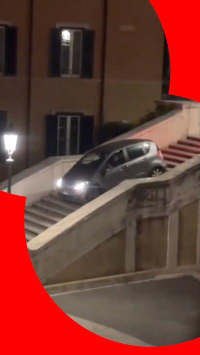 Car going down the Spanish Steps 