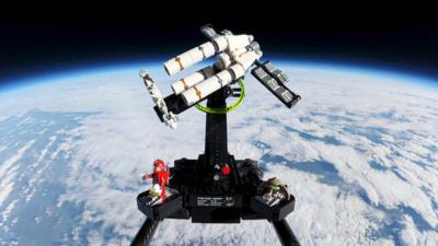 The lego model above the Earth