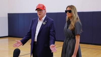 Donald Trump and his wife speaking at a polling station in Florida