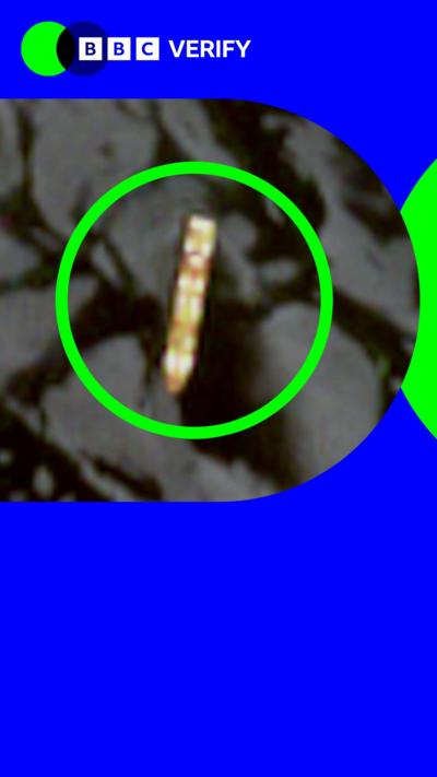 A ship circled in green 