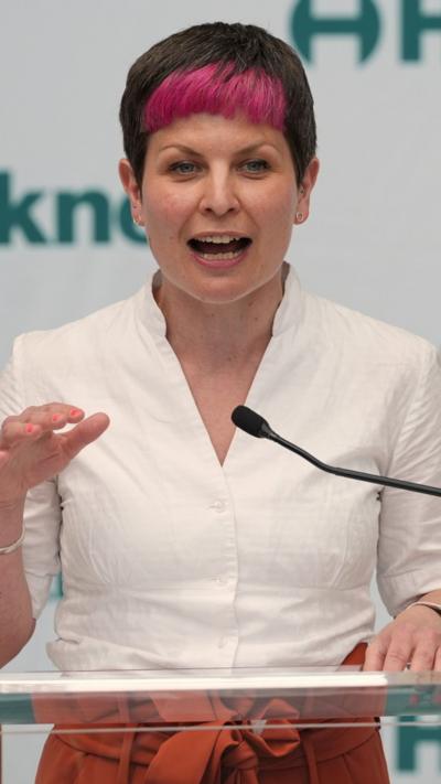 Zoe Garbett at a podium