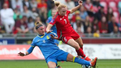 Wales' Ceri Holland and Ukraines' Daiana Semkiv collide