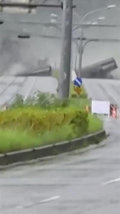 Dark water crashes into a collapsing bridge.
