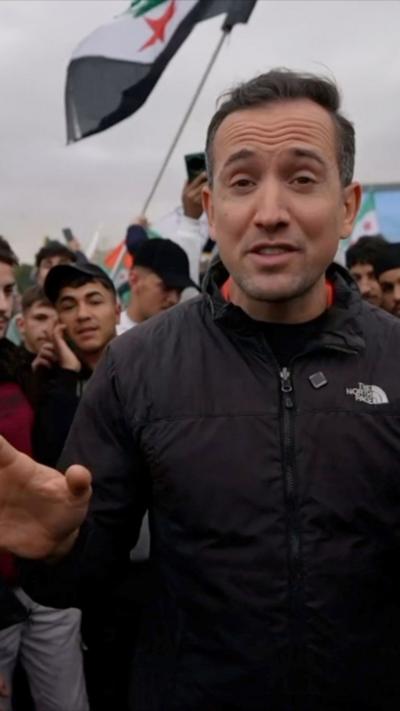 Hugo Bachega wears a black jacket