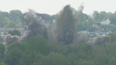 Smoke and debris from exploded bomb