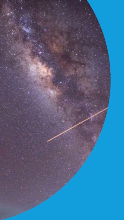 A meteor passes in front of the Milky way 