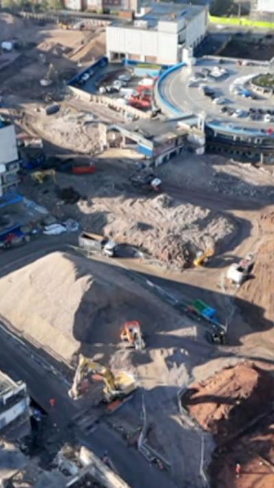 Drone footage of a building site in Coventry city centre, showing excavation work that is under way