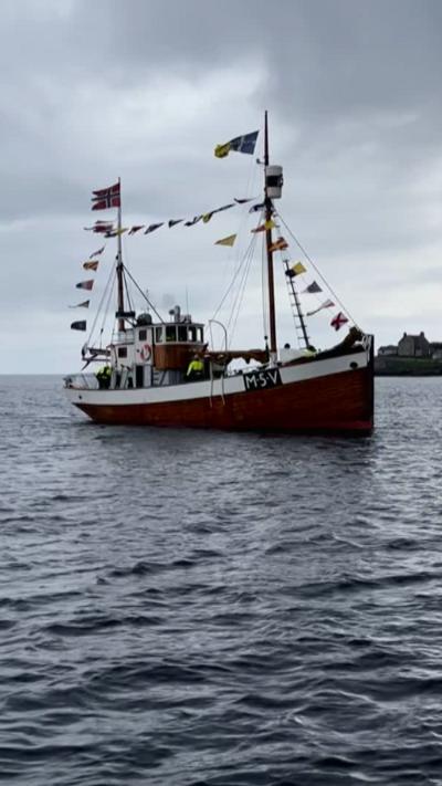 Norwegian fishing boat travelling in the sea near Lerwick in Shetland