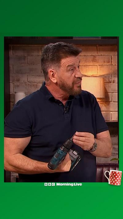 Nick Knowles in the Morning Live studio, holding a drill