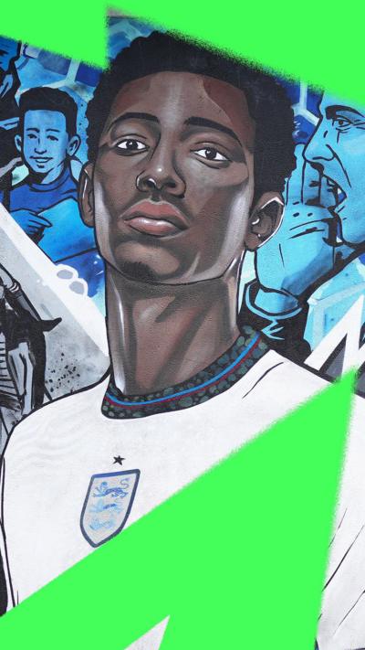 A mural of Jude Bellingham in an England shirt, painted on an outside wall in Stourbridge