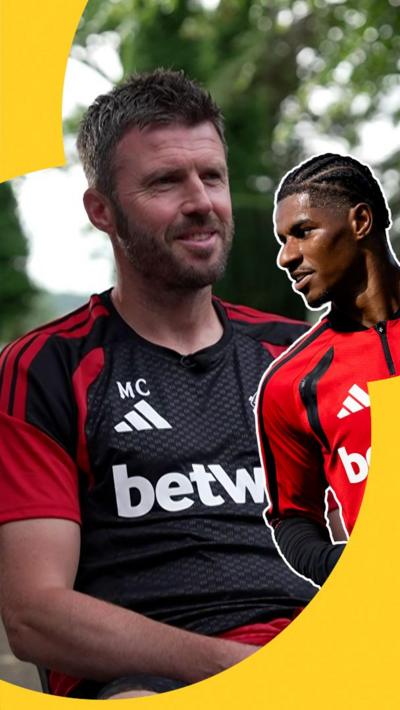 Michael Carrick with a cutout of Marcus Rashford