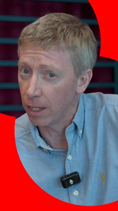 Correspondent Kevin Peachey wearing pale blue shirt