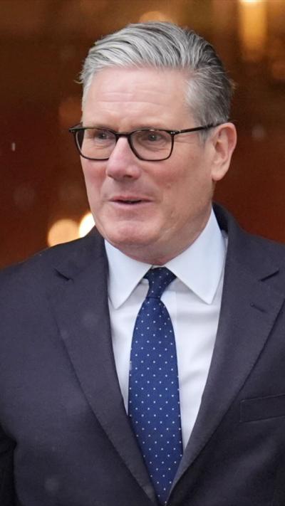 Keir Starmer image looking forward with glasses on