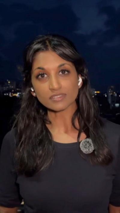 A woman in a black dress