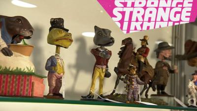 Some old toys and the Strange News logo