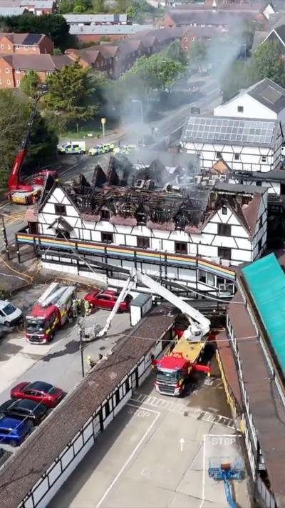 Drone shot of burnt out roof of Pink Punters nightclub near Milton Keynes