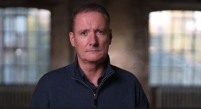 Former prison officer looking directly at the camera 