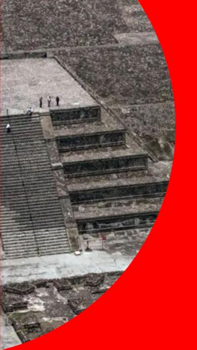 People standing on a raised platform at Teotihuacán pyramid in Mexico, seen from above.