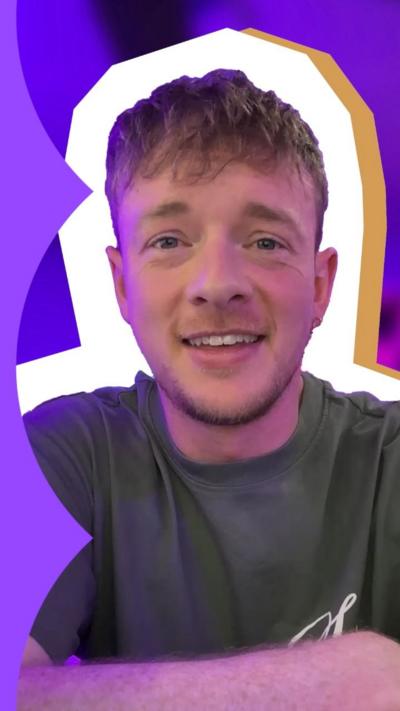 Calum Leslie smiles in front of a cutout composite background