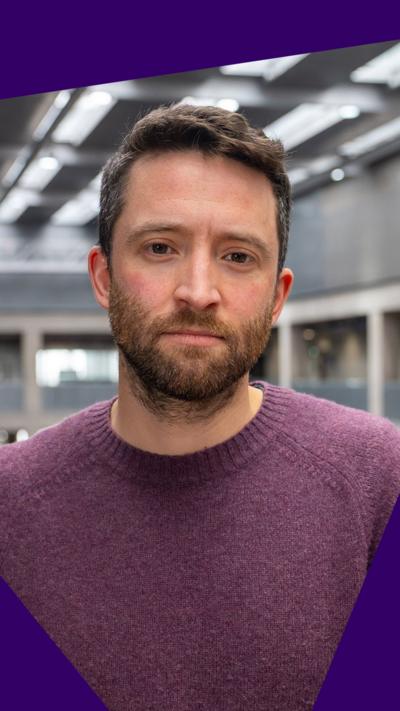A close shot of David Wallace Lockhart in the BBC newsroom in Scotland.