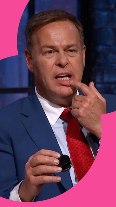 Peter Jones putting balm on his lips