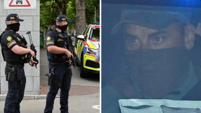 Police on left Kinahan on right