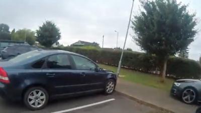 Car driving on pavement