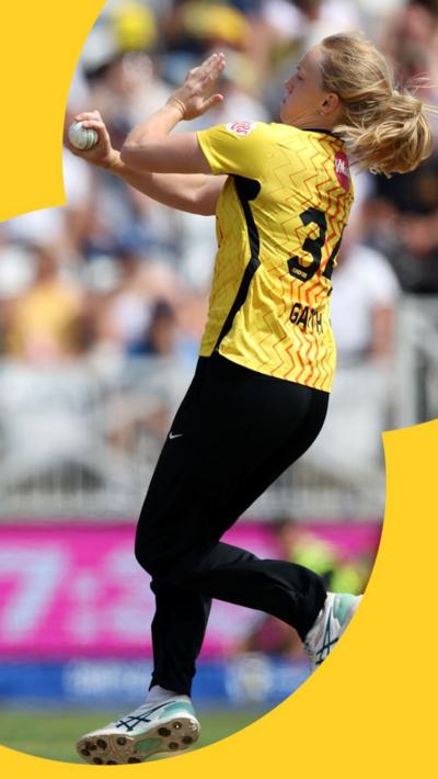 Kim Garth runs in to bowl