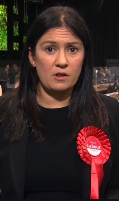 Lisa Nandy wearing a red rosette