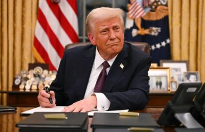 Donald Trump at Oval Office desk