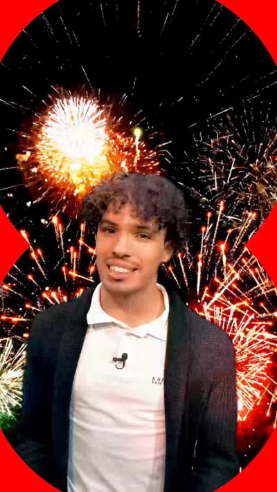 Presenter Tyler Edwards superimposed on top of fireworks
