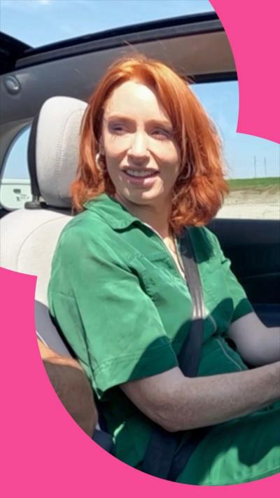A woman driving a car