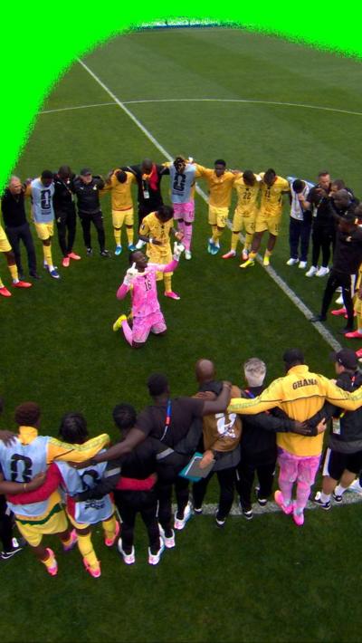 Ghana squad pray together on the pitch at full time at the 2026 World Cup