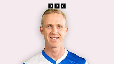 Adam Forshaw shown from shoulders up smiling with a Blackburn shirt on. The BBC Logo is just above his head.