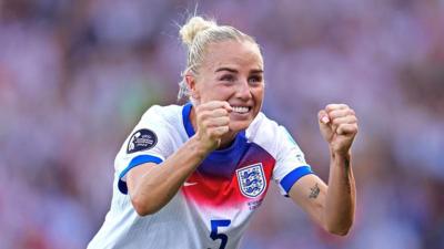 Alex Greenwood clenching fists