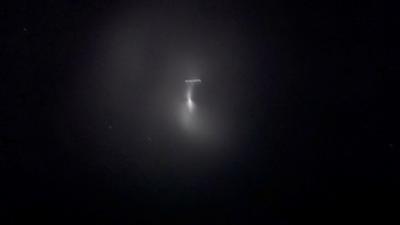 A picture of the dark black sky with the shining object.