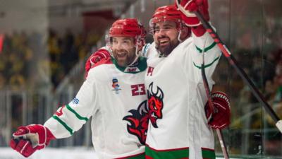 Cardiff Devils Evan Mosey and Cody Donaghey celebrate against Katowice