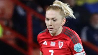 Ceri Holland attacks for Wales against Sweden