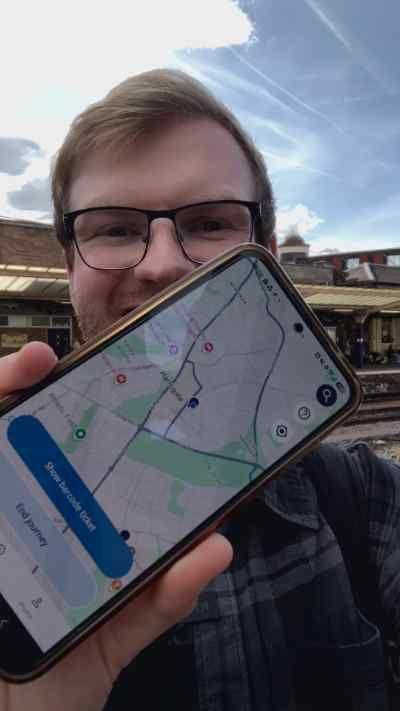 A man holds a phone