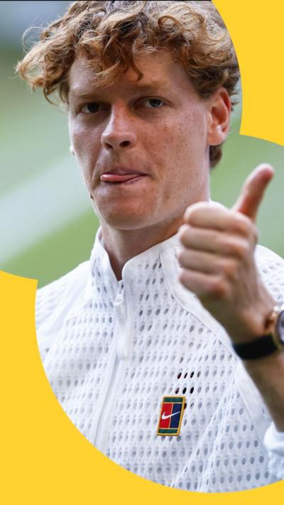 Jannik Sinner gives a thumbs up after winning Wimbledon
