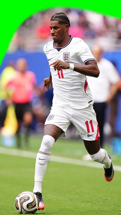Marcus Rashford running across the pitch as England play France in the 2026 World Cup.