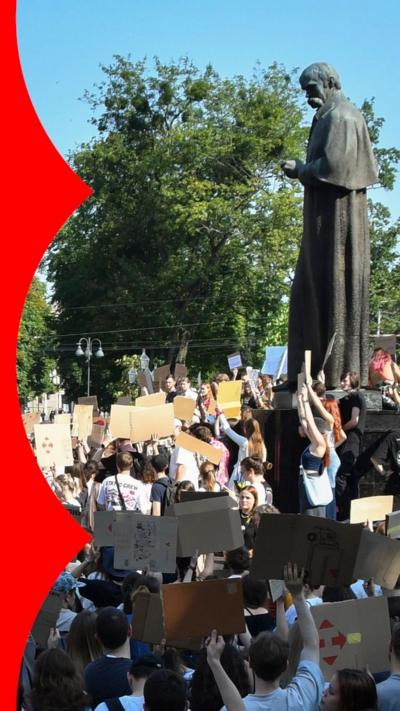 Groups of Ukrainians protesting against Zelensky's removal of the defence minister.