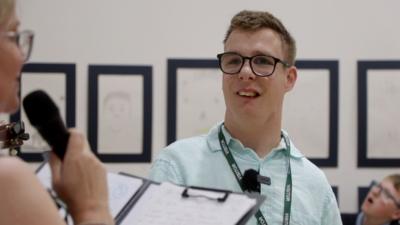 Harrison Holmes, the radio DJ with cerebral palsy, during his school assembly