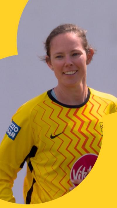 Sam Bates smiles after bowling Alice Capsey