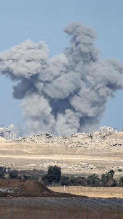 Smoke rises over Gaza skyline